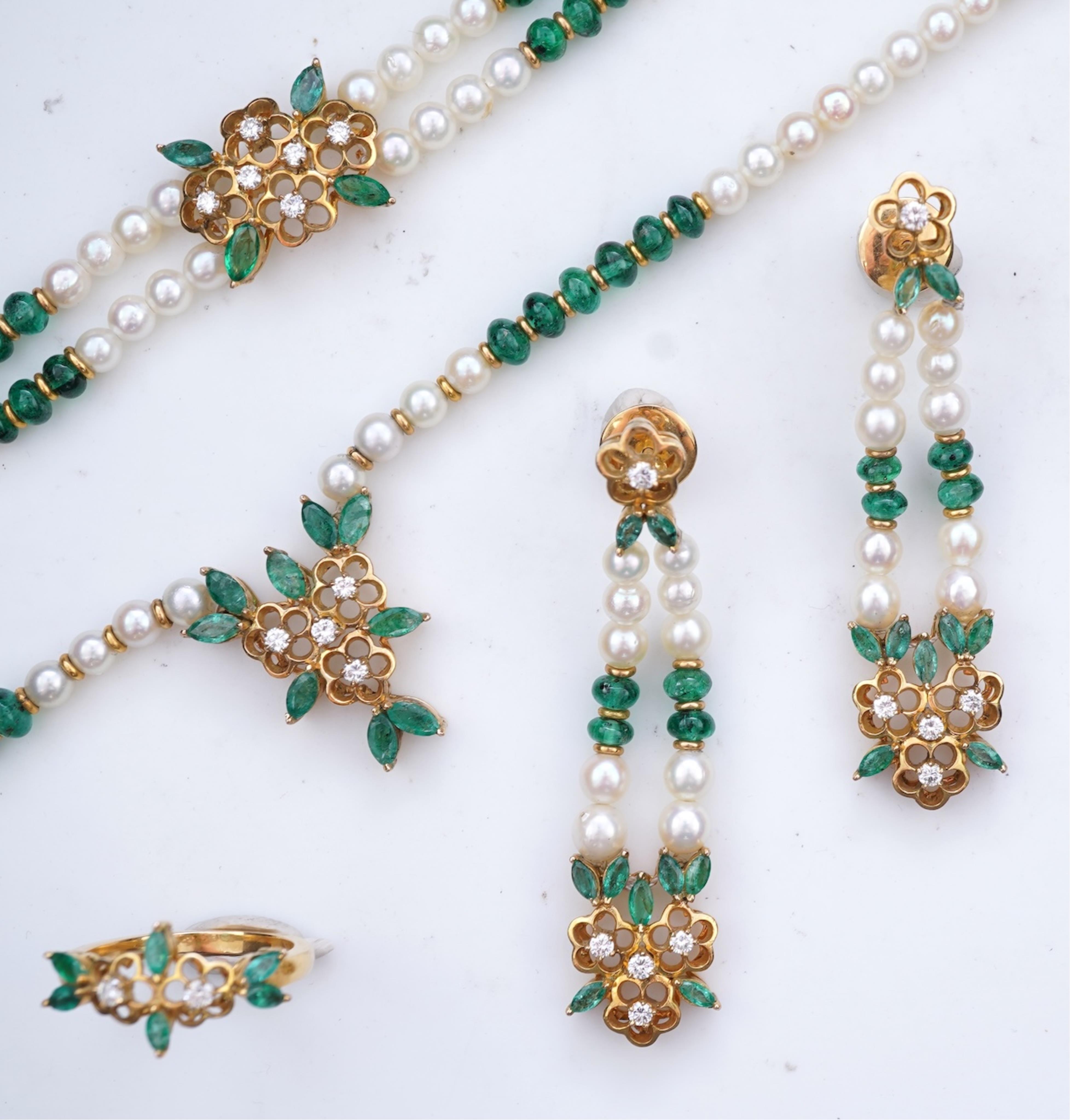 A cultured pearl, emerald and diamond parure
